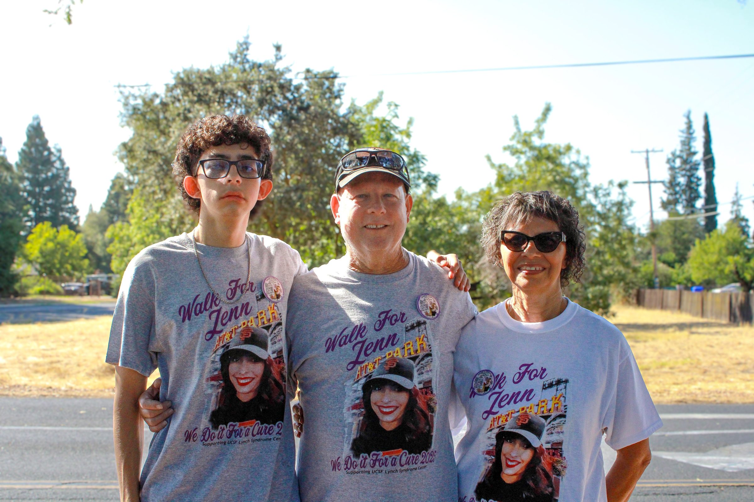 Paul and Lisa Baxter with their grandson Ethan after the 2025 Walk for Jenn.
