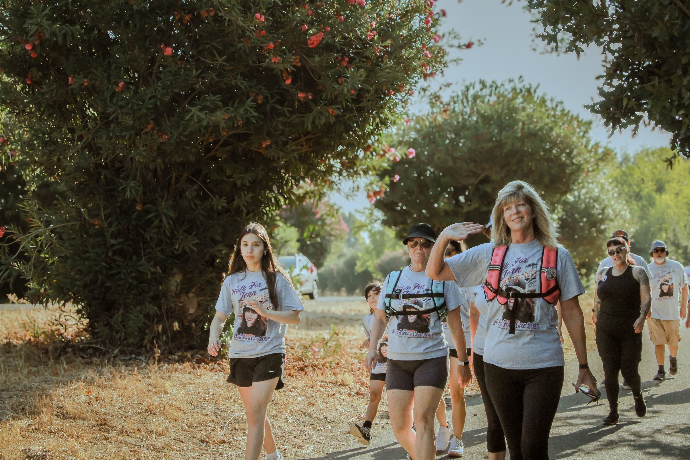 Walkers setting off along the Bear Creek path.